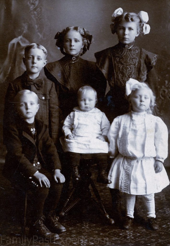 Older children in the C.B. and Bertha Christianson family. Bennett Nils is standing, back, left. 